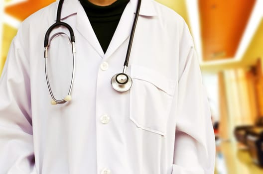Doctor with a stethoscope in hospital. (Medical Concept)