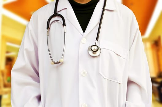 Doctor with a stethoscope in hospital. (Medical Concept)