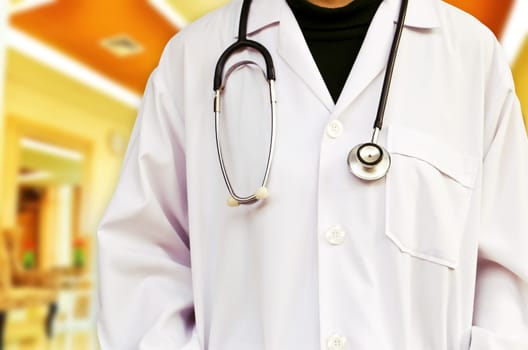 Doctor with a stethoscope in hospital. (Medical Concept)