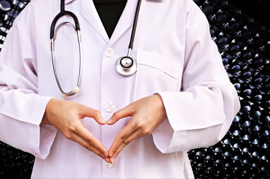 Heart hand doctor with a stethoscope isolated white background. (Medical Health Care Concept)