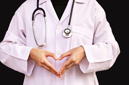 Heart hand doctor with a stethoscope isolated white background. (Medical Health Care Concept)