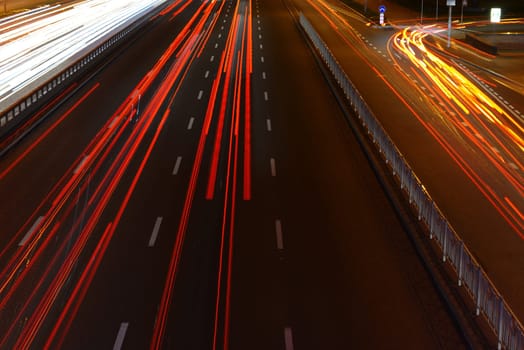 Evening view on highway with blurred moving cars