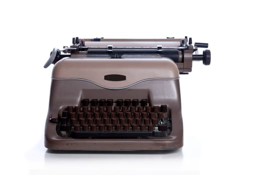 Antique grey mechanical typewriter against white background