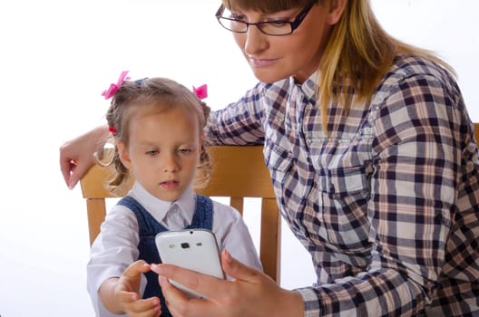 mother and daughter with mobile phone