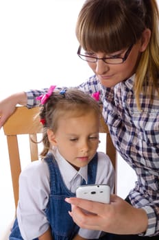 mother and daughter with mobile phone