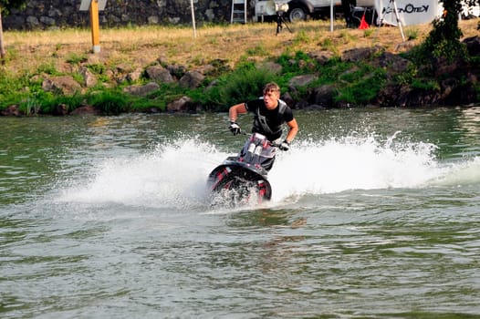 Ales - France - on July 14th, 2013 - Championship of France of Jet Ski on the river Gardon. lifting category or freestyle