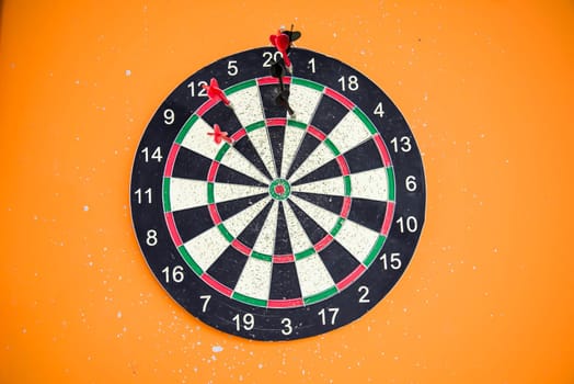 The darts on the wall in the gyms.