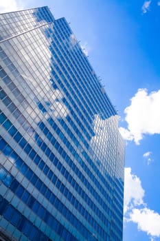 Abstract building. blue glass wall of skyscraper