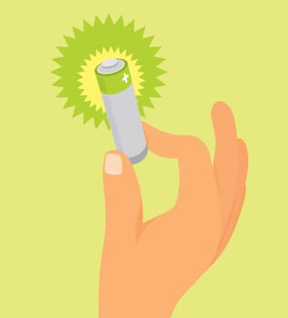 Hand holding green battery
