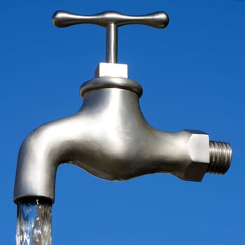 Illusion with a magic faucet and flowing water