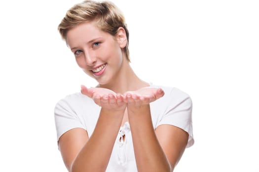 Young laughing woman holds hands for product placement on white background