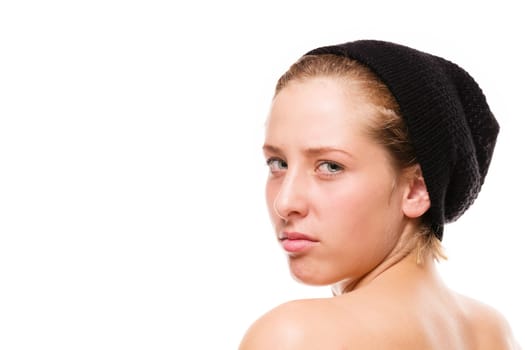 Angry woman looks over her shoulder on a white background