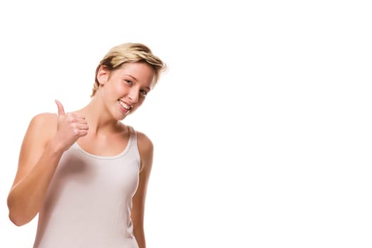Young woman gives thumbs up on a white background