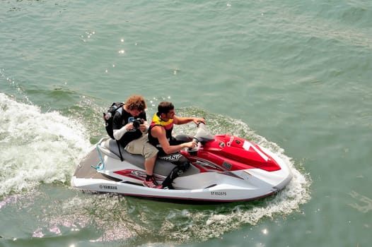 Ales - France - on July 14th, 2013 - Championship of France of Jet Ski on the river Gardon. Photographer on jet ski