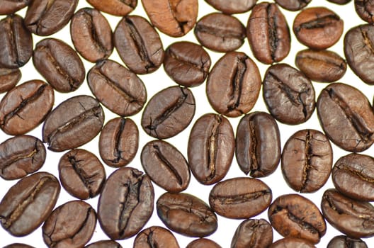roasted coffee beans isolated on white background
