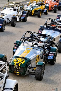chases of Caterham on the circuit of the Cevennes with Ales in the French department of Gard the May 24th and 25th, 2013. on the starting line before the race