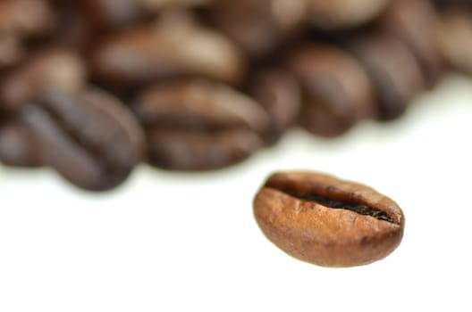 roasted coffee beans isolated on white background