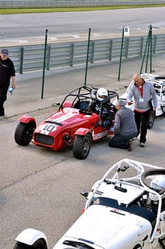 chases of Caterham on the circuit of the Cevennes with Ales in the French department of Gard the May 24th and 25th, 2013. on the starting line before the race