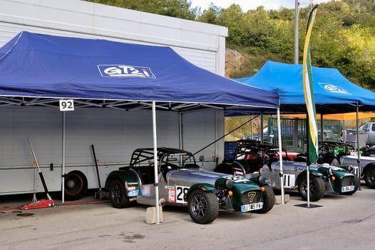 chases of Caterham on the circuit of the Cevennes with Ales in the French department of Gard the May 24th and 25th, 2013. The Caterham stands