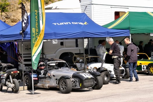 chases of Caterham on the circuit of the Cevennes with Ales in the French department of Gard the May 24th and 25th, 2013. The Caterham stands