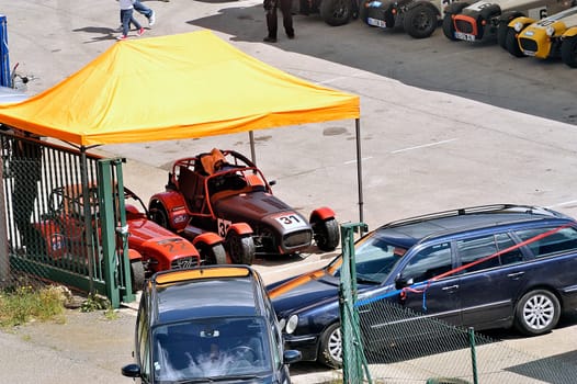 chases of Caterham on the circuit of the Cevennes with Ales in the French department of Gard the May 24th and 25th, 2013. The Caterham stands