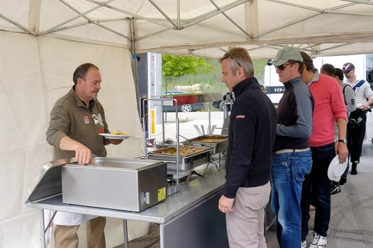chases of Caterham on the circuit of the Cevennes with Ales in the French department of Gard the May 24th and 25th, 2013. the pause lunch