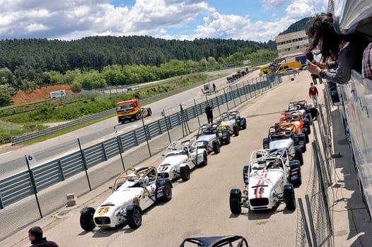 chases of Caterham on the circuit of the Cevennes with Ales in the French department of Gard the May 24th and 25th, 2013. on the starting line before the race