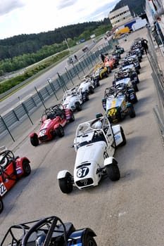 chases of Caterham on the circuit of the Cevennes with Ales in the French department of Gard the May 24th and 25th, 2013. on the starting line before the race