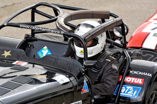 chases of Caterham on the circuit of the Cevennes with Ales in the French department of Gard the May 24th and 25th, 2013. on the starting line before the race