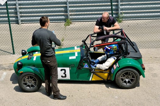 chases of Caterham on the circuit of the Cevennes with Ales in the French department of Gard the May 24th and 25th, 2013. on the starting line before the race