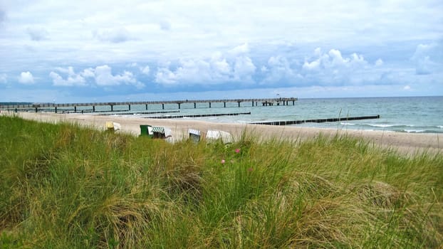 Behind the beach of Kühlungsborn, Baltic Sea, Germany with view towards the pier
