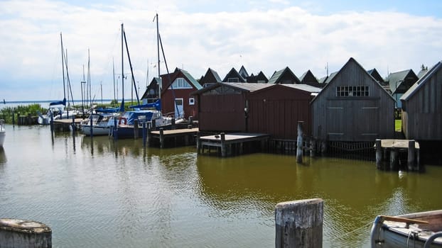 Boat houses at the harbor of Niehagen, Ahrenshoop, peninsula Fischland-Darss-Zingst