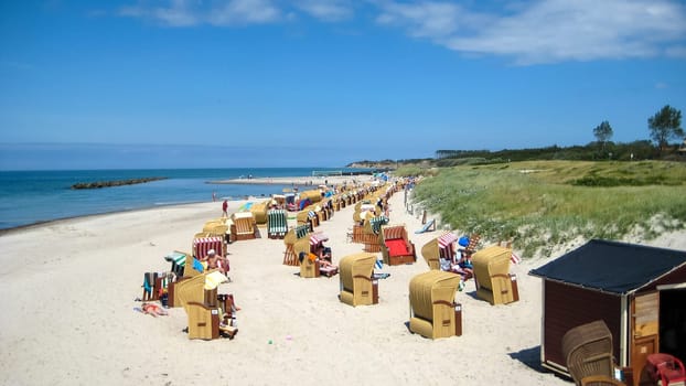 Wustrow beach with beach chairs, view from the pier
