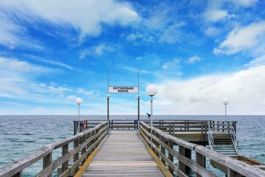 Pier in Rerik, baltic sea, with blue cloudy sky