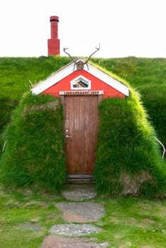 Lindarbakki house with roof covered with grass in Iceland Borgarfjordur