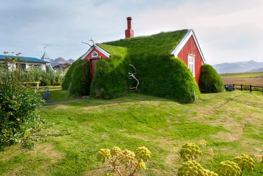 Lindarbakki house with roof covered with grass in Iceland Borgarfjordur