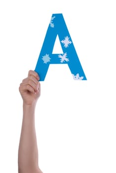 A Hand Holding the Blue and Snowy Letter A, Isolated