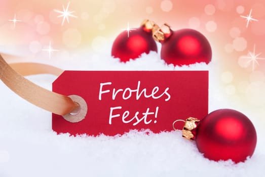 A Red Label With the German Words Frohes Fest Which Means Merry Christmas on It