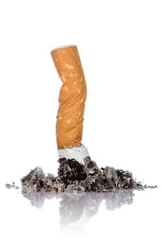 Single cigarette butt with ash over a white background.