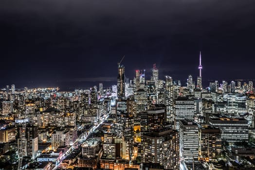 Full view of downtown Toronto at night with glamour lights