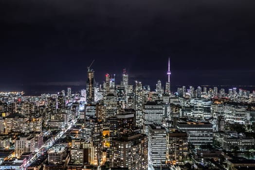 Full view of downtown Toronto at night with glamour lights