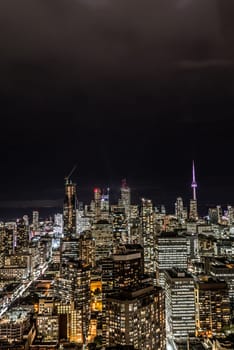 Full view of downtown Toronto at night with glamour lights