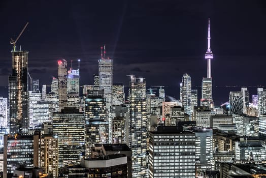 Full view of downtown Toronto at night with glamour lights