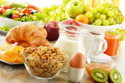 Breakfast with coffee, juice, croissant, salad, muesli and egg. Swedish buffet