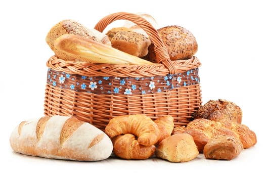 Wicker basket with baking products isolated on white