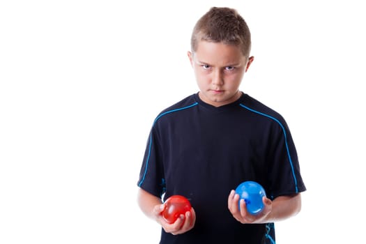 Boy holding water balloons isolated on white background