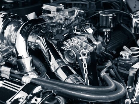 Toned image of an engine compartment of a classic muscle car