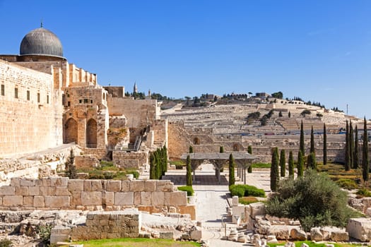 View of old city wall of Jerusalem with Al Aksa mosque, Mount Olive and the cemetery
