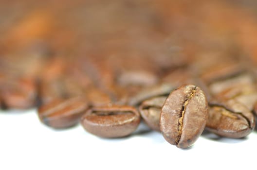 roasted coffee beans isolated on white background