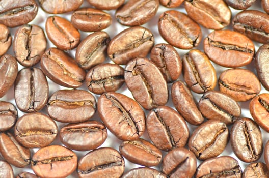roasted coffee beans isolated on white background